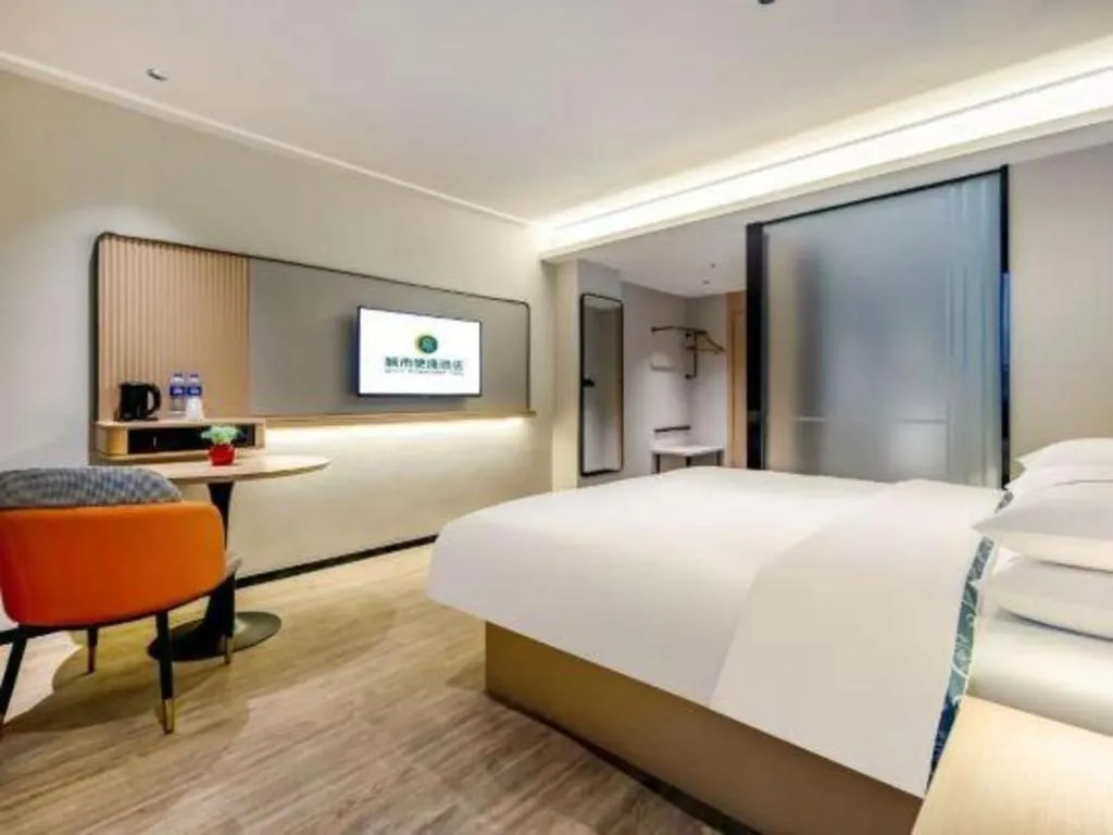 Bed in City Comfort Inn Wuzhou Municipal Square
