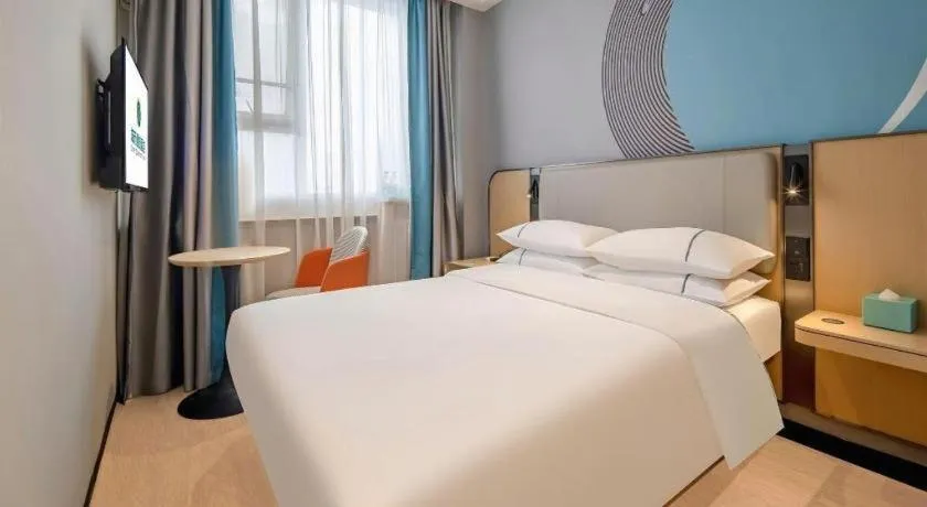 Bed in City Comfort Inn Wuzhou Municipal Square