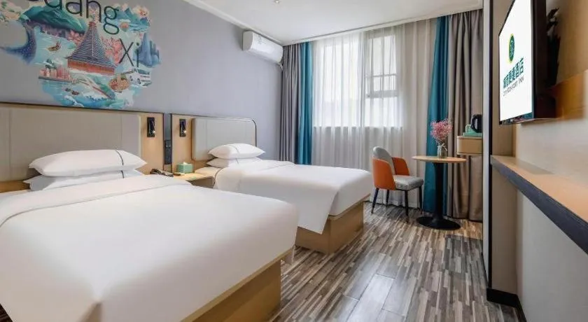Bed in City Comfort Inn Wuzhou Municipal Square