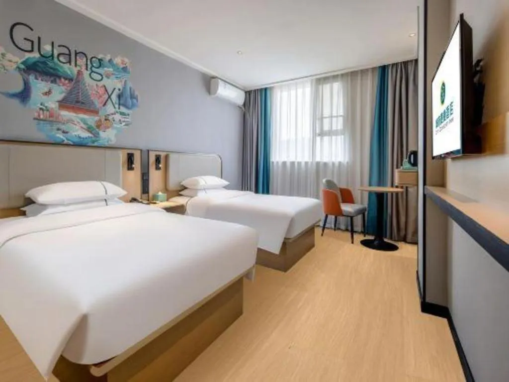 Bed in City Comfort Inn Wuzhou Municipal Square