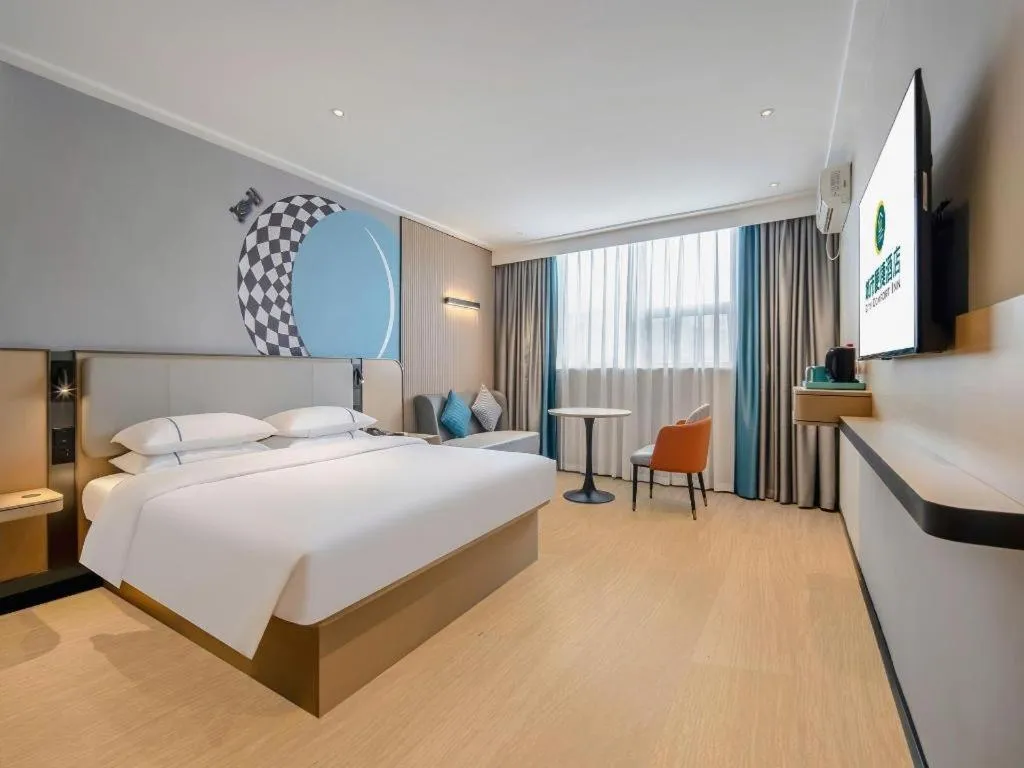 Bed in City Comfort Inn Wuzhou Municipal Square