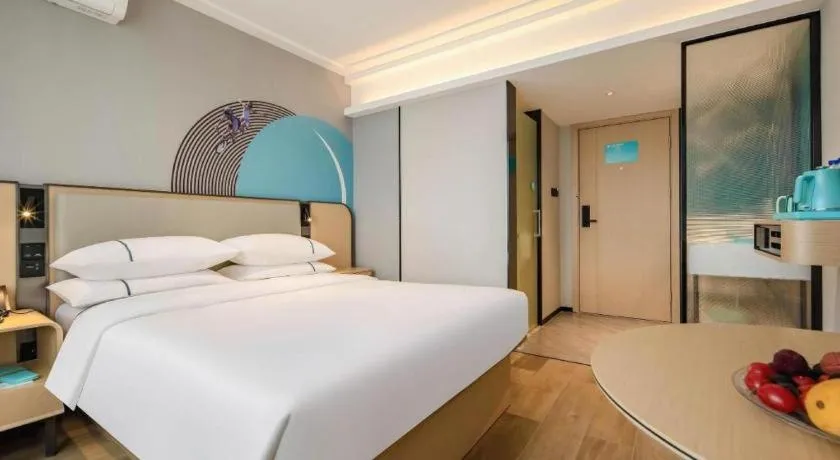 Bed in City Comfort Inn Wuzhou Municipal Square