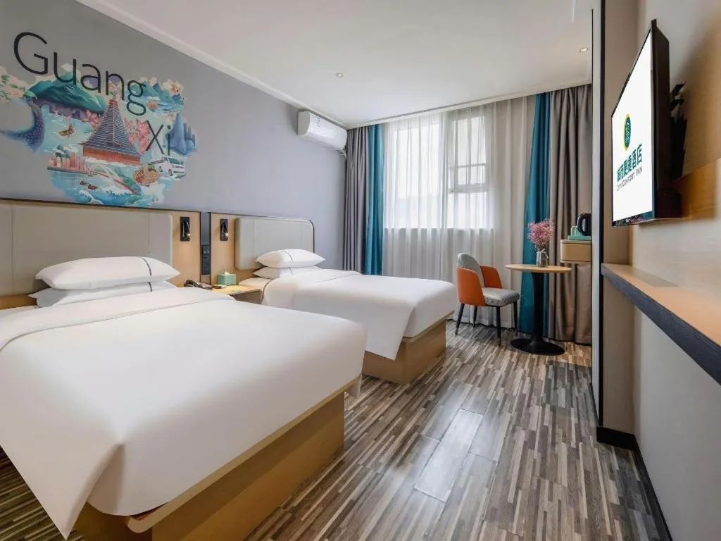 Bed in City Comfort Inn Wuzhou Municipal Square