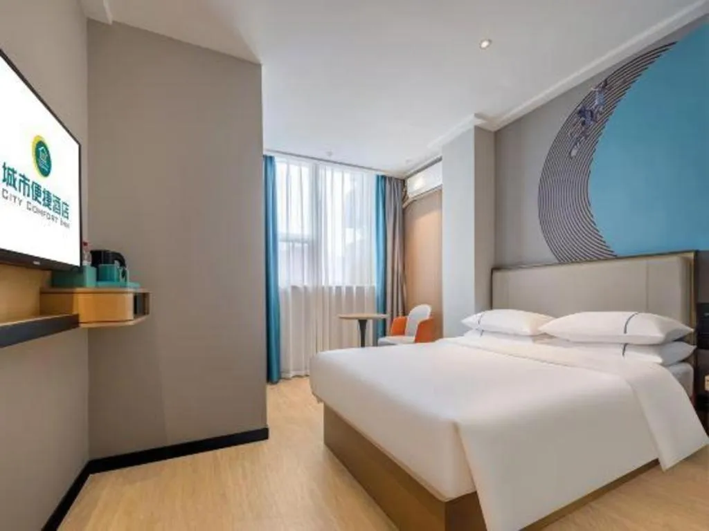 Bed in City Comfort Inn Wuzhou Municipal Square