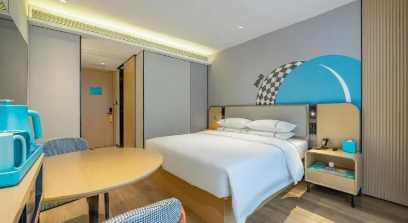 Bed in City Comfort Inn Wuzhou Municipal Square