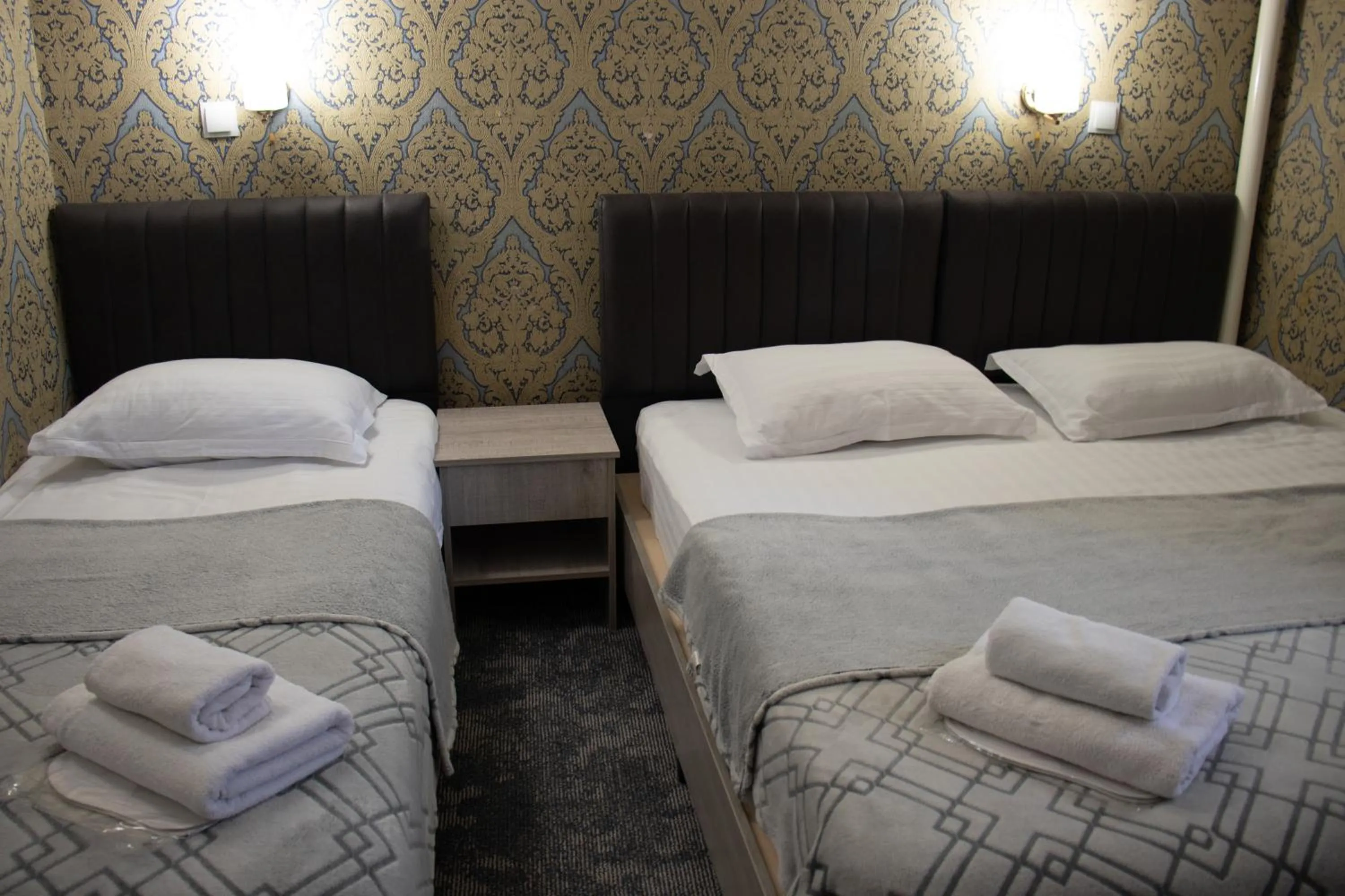 Bed in Orzu Hotel