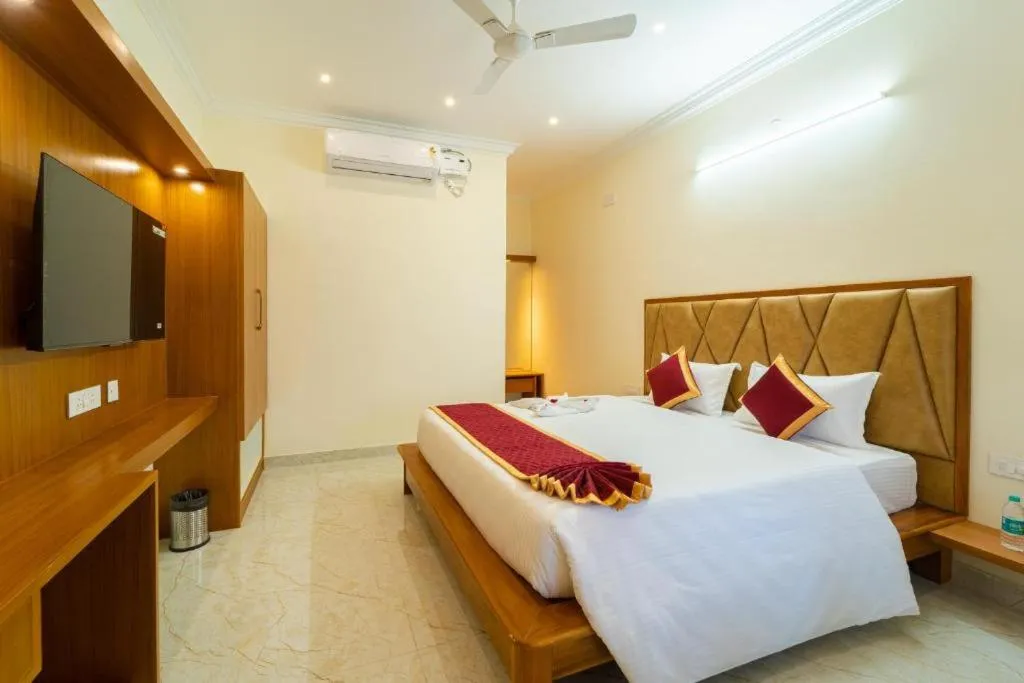 Bed in AR Phalazzo Resort and Banquets