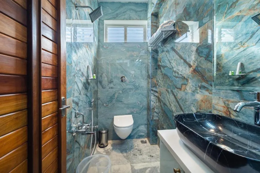 Shower in AR Phalazzo Resort and Banquets