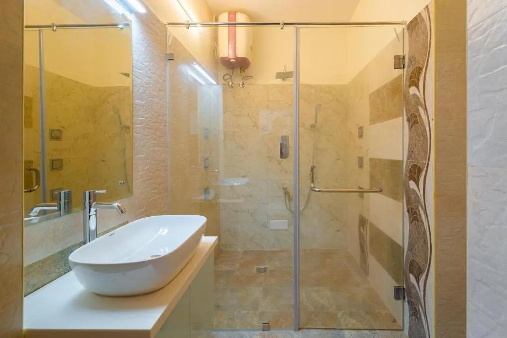Shower in AR Phalazzo Resort and Banquets