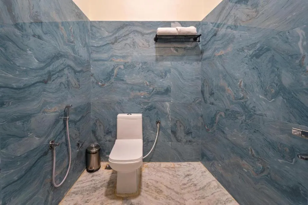Toilet in AR Phalazzo Resort and Banquets