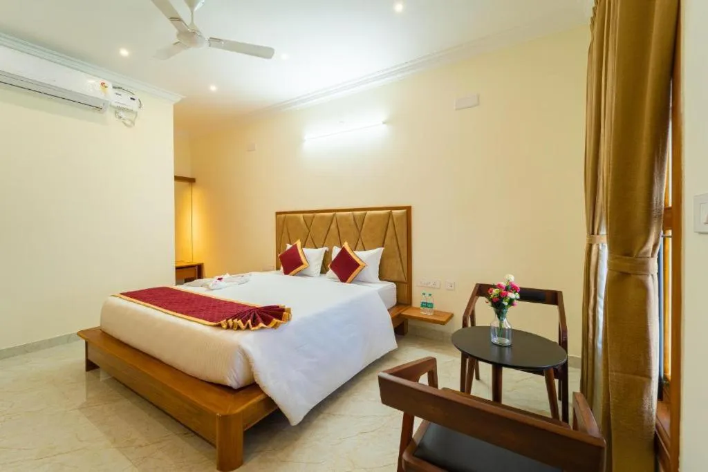 Bed in AR Phalazzo Resort and Banquets