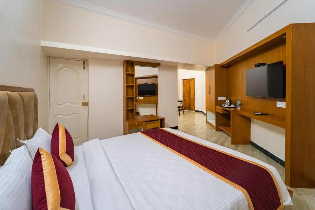 Bed in AR Phalazzo Resort and Banquets