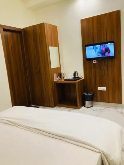 Bed in Hotel Shrinath Palace