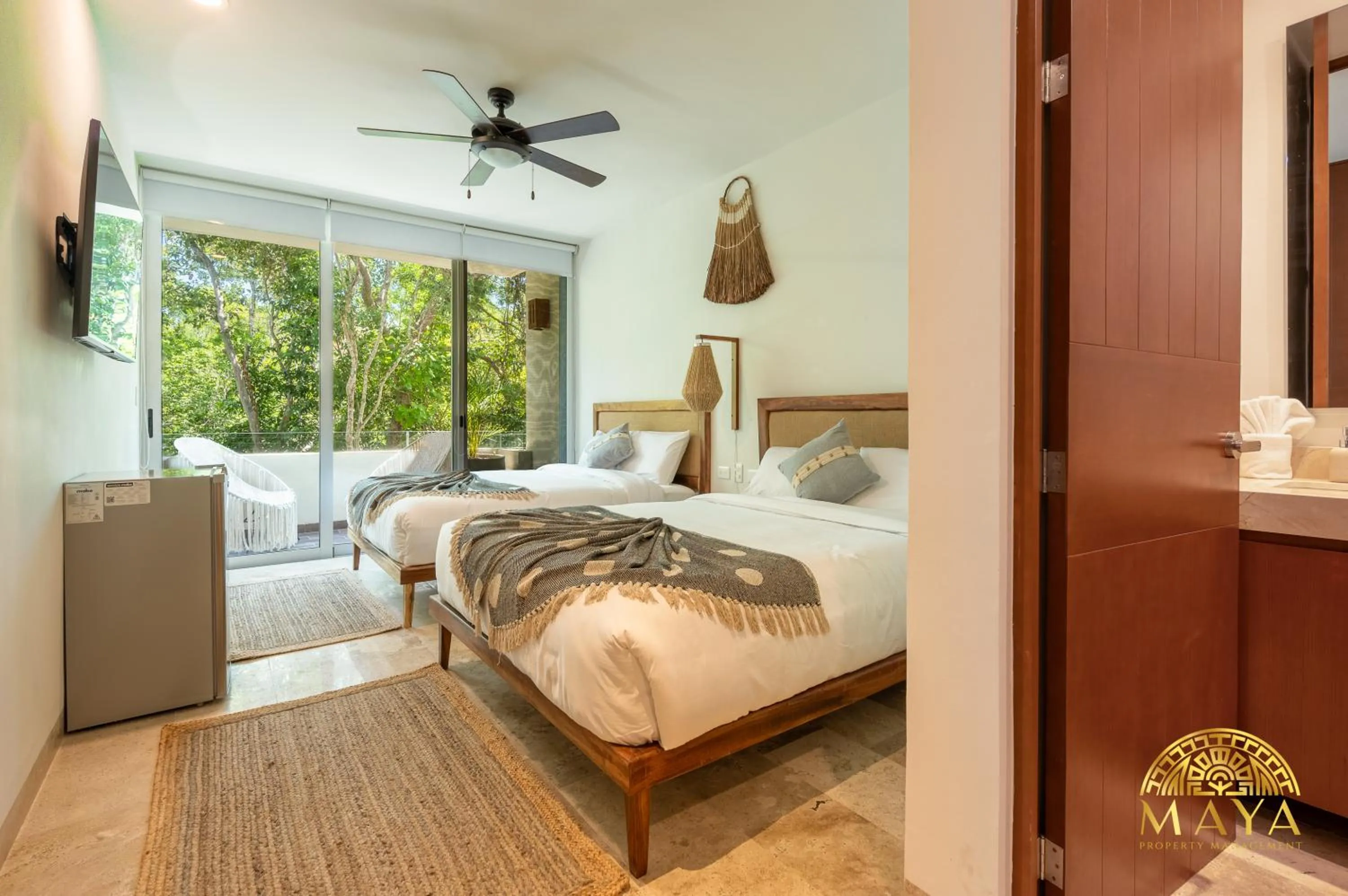 Bed in Nhoa Tulum Aparthotel by Maya PM