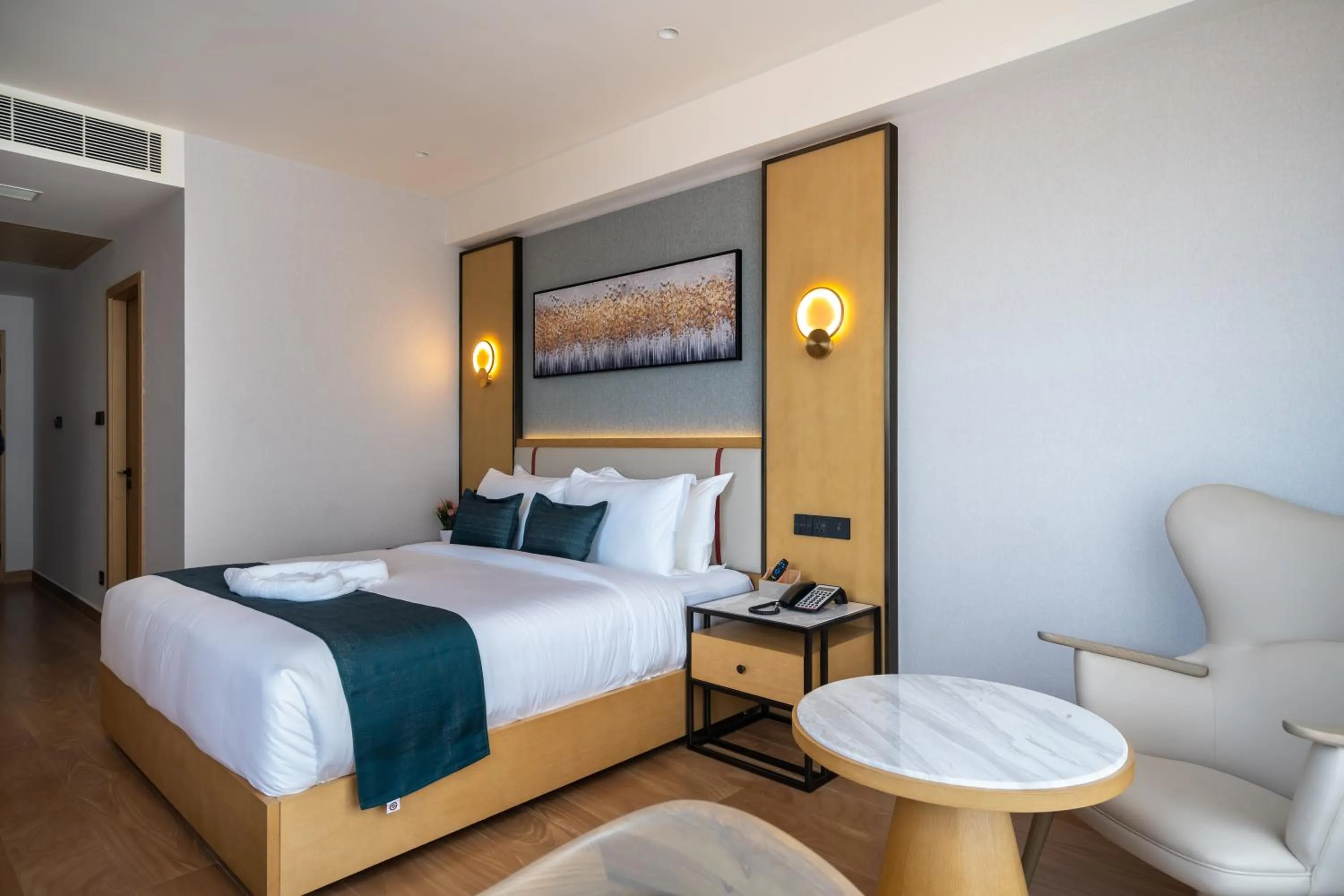 Bed in Copper Leaf Hotels, Tirunelveli