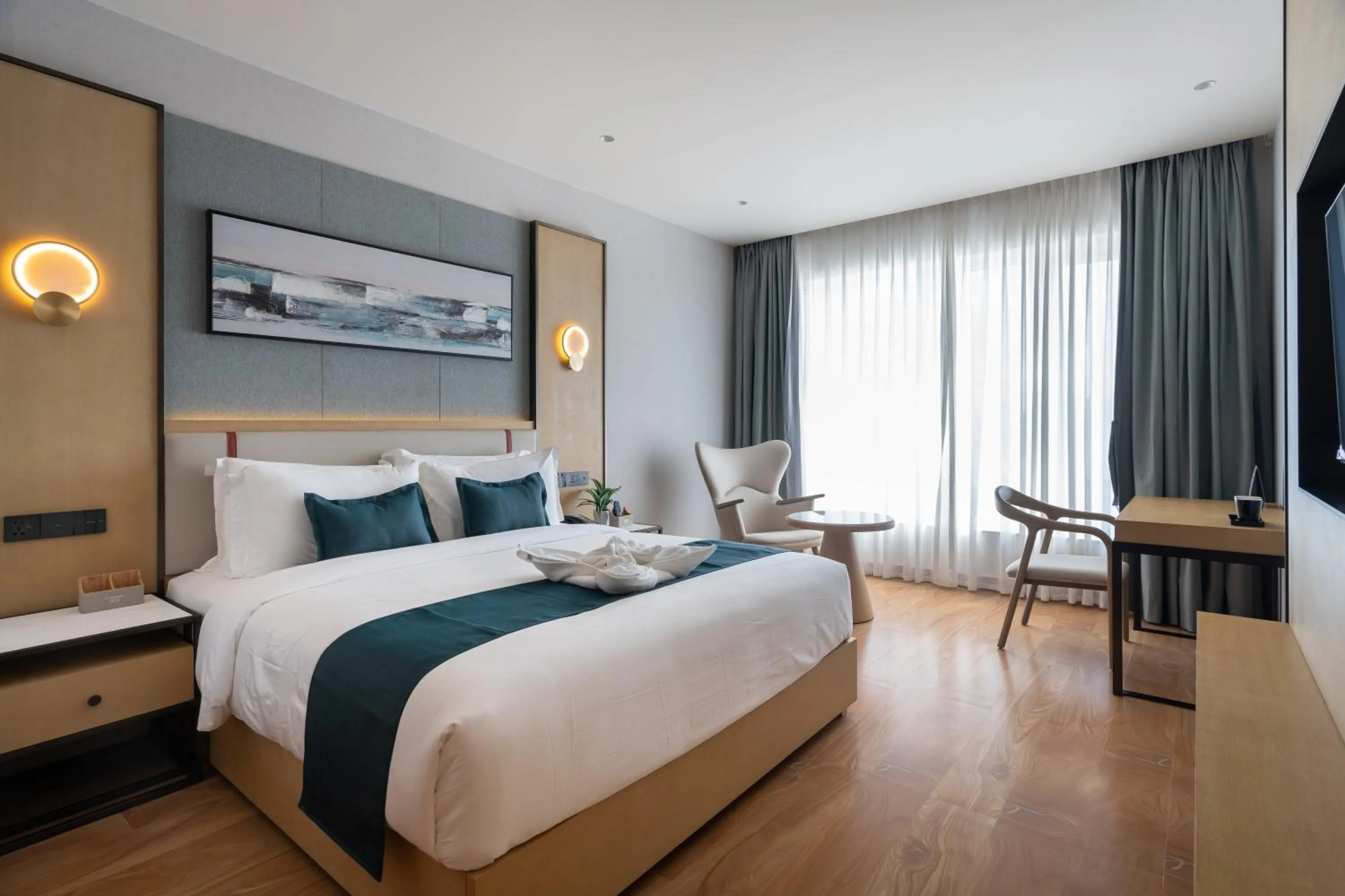 Bed in Copper Leaf Hotels, Tirunelveli