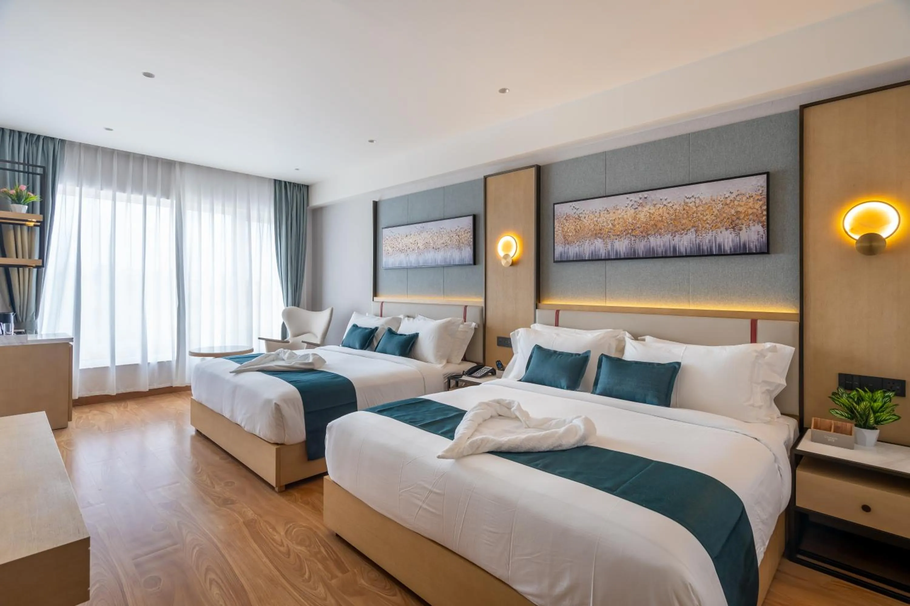 Bed in Copper Leaf Hotels, Tirunelveli