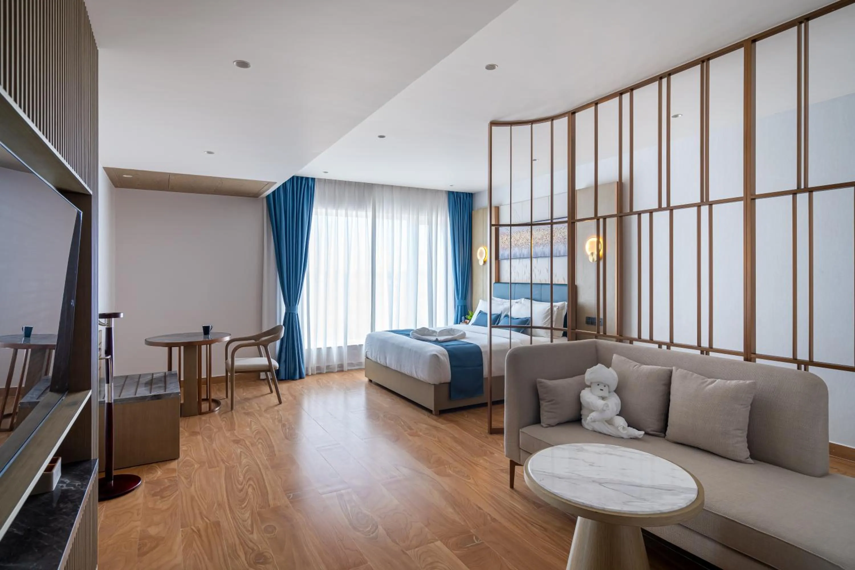 Seating area, Bed in Copper Leaf Hotels, Tirunelveli
