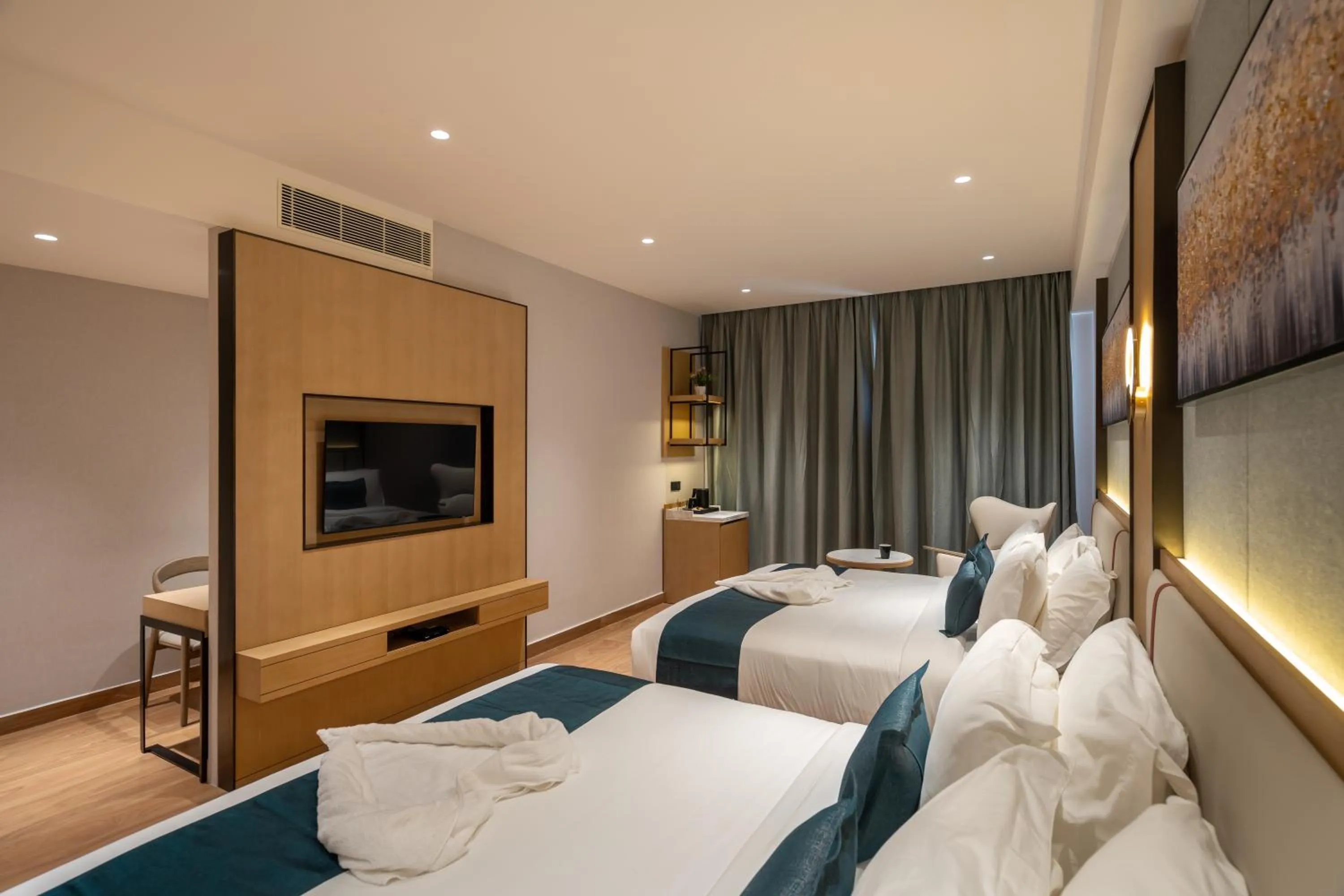 Bed in Copper Leaf Hotels, Tirunelveli