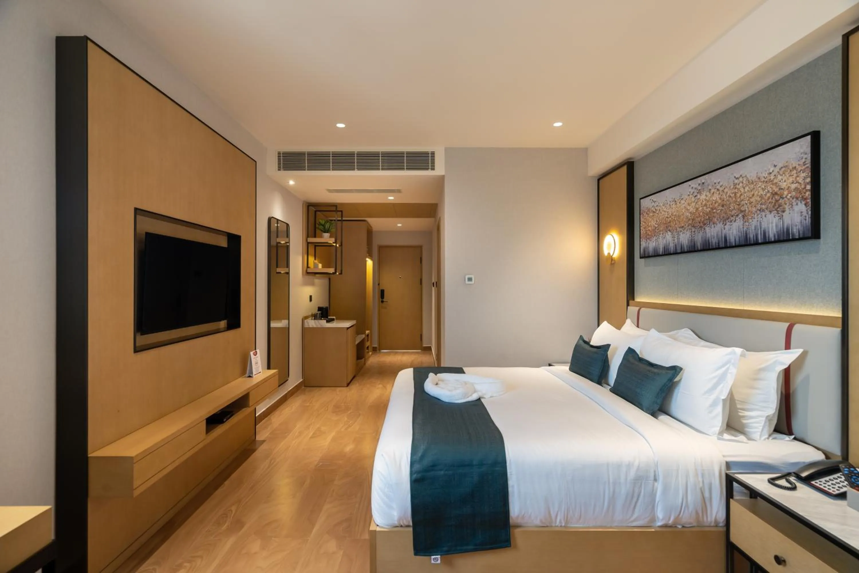 Bed in Copper Leaf Hotels, Tirunelveli