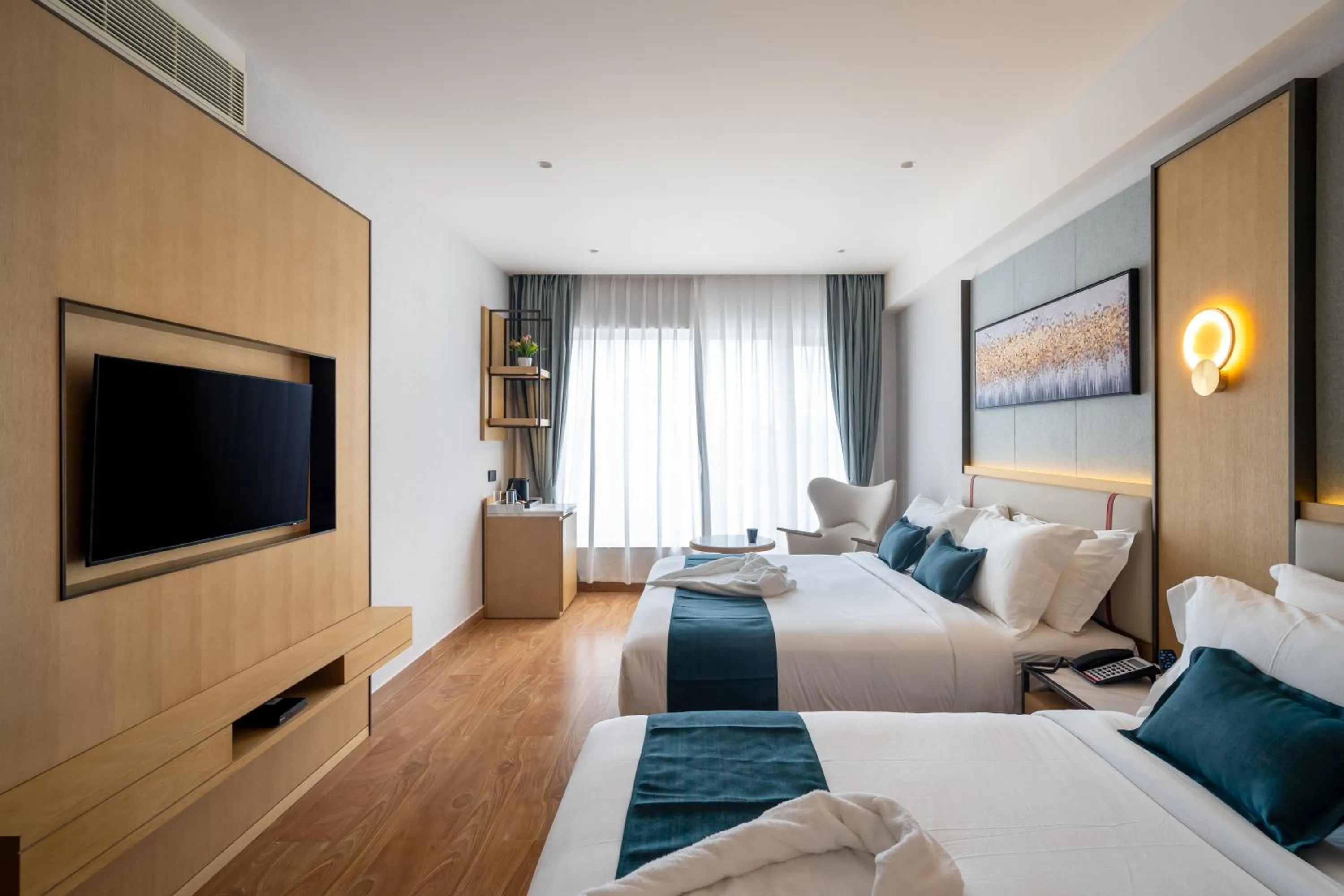 Bed in Copper Leaf Hotels, Tirunelveli