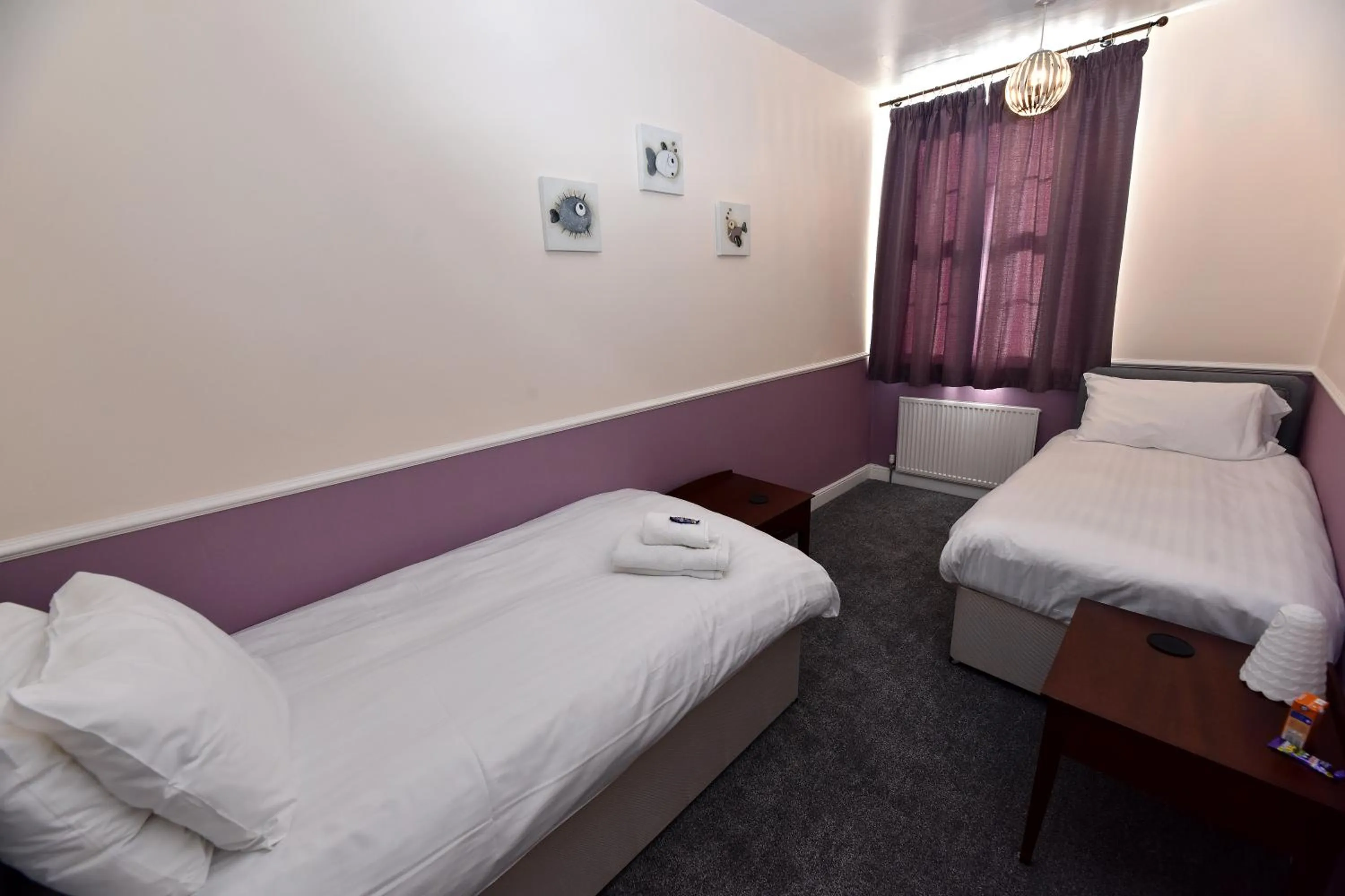 Bed in Phoenix Court Hotel