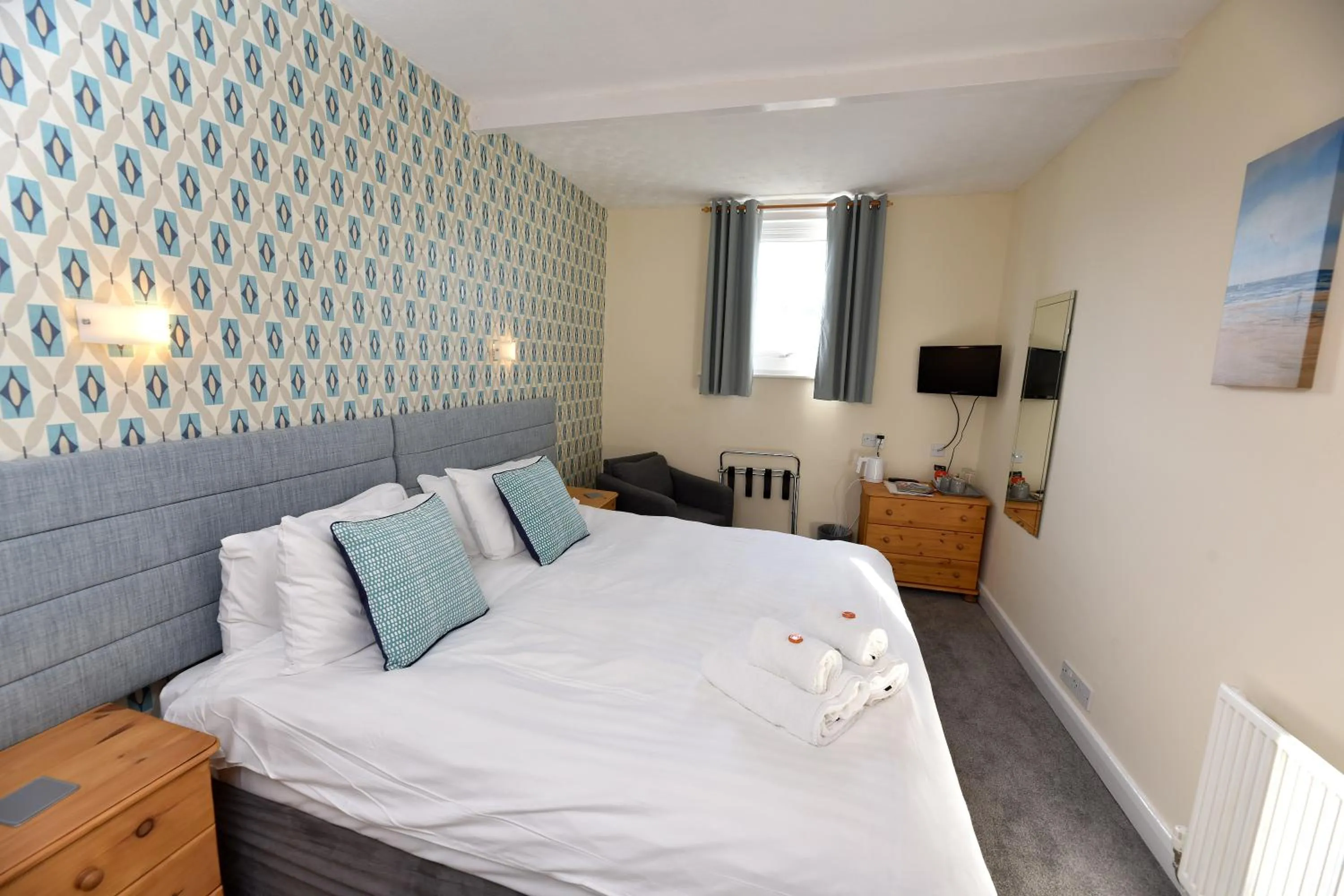 Bed in Phoenix Court Hotel