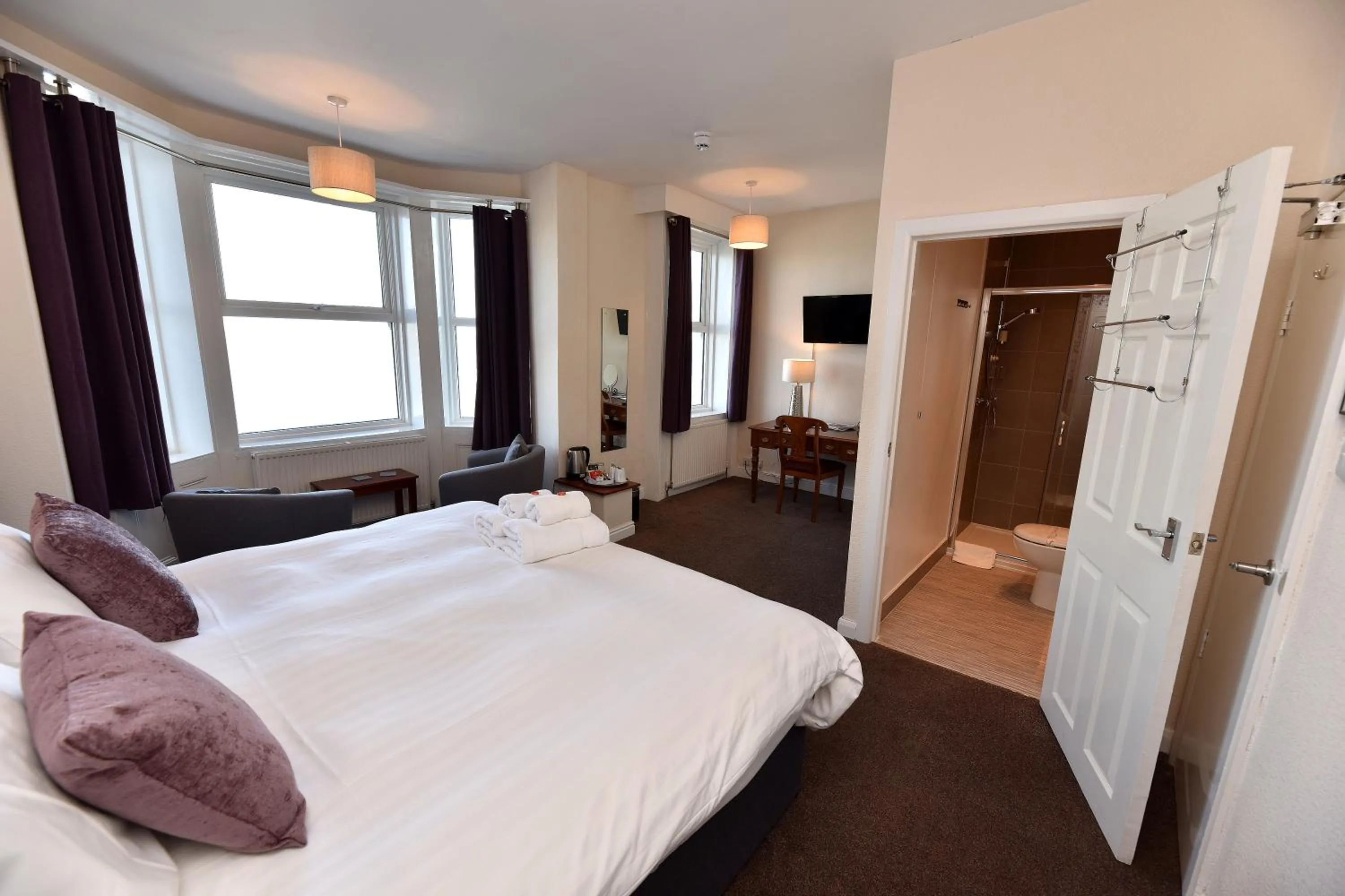 Bed in Phoenix Court Hotel