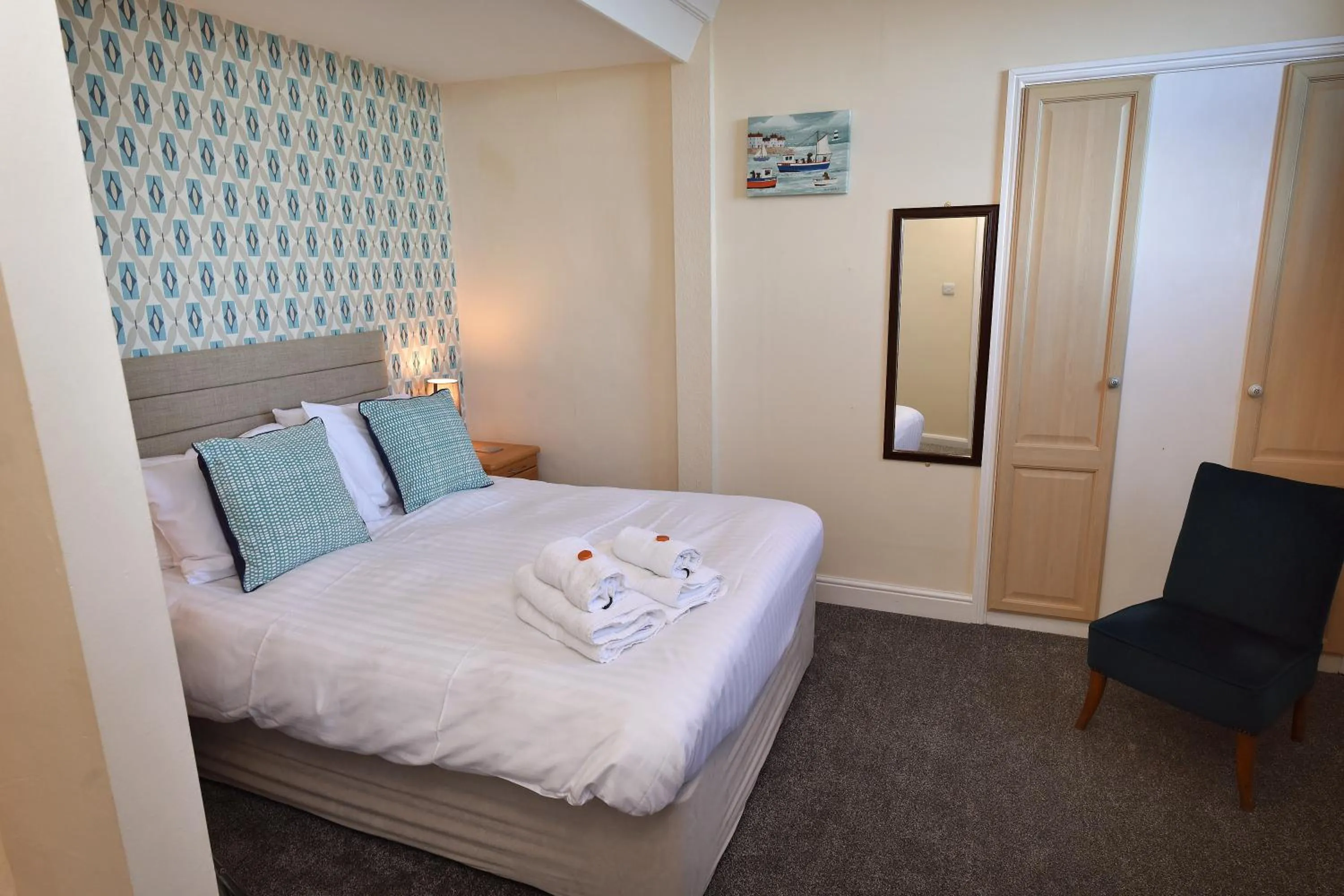 Bed in Phoenix Court Hotel