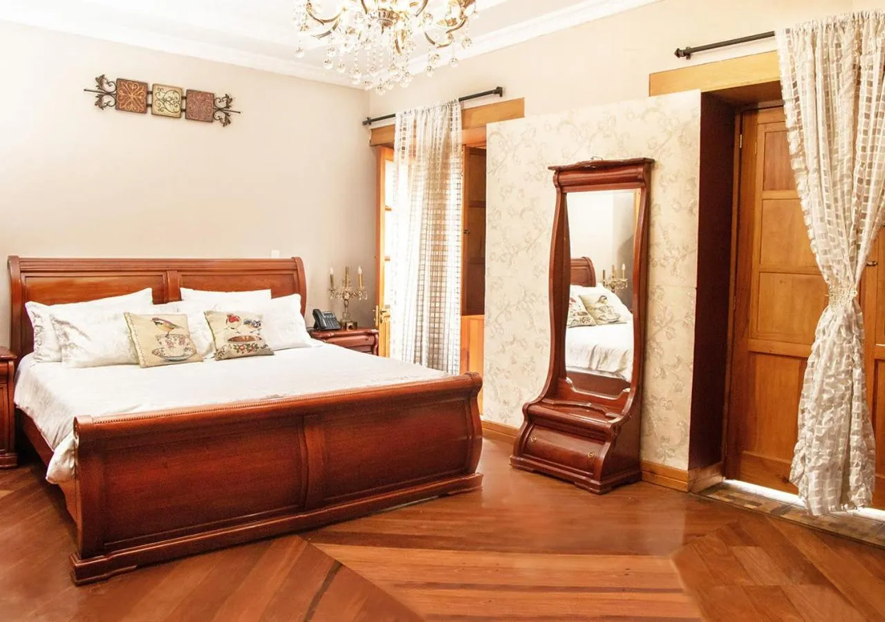 Bed in Hotel Boutique Casa Ruth en Cuenca