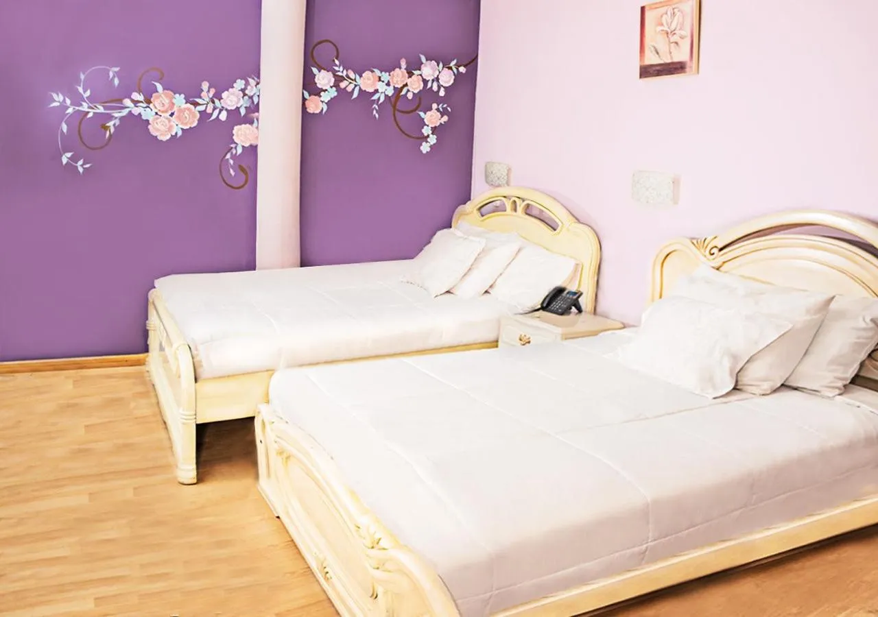 Bed in Hotel Boutique Casa Ruth en Cuenca