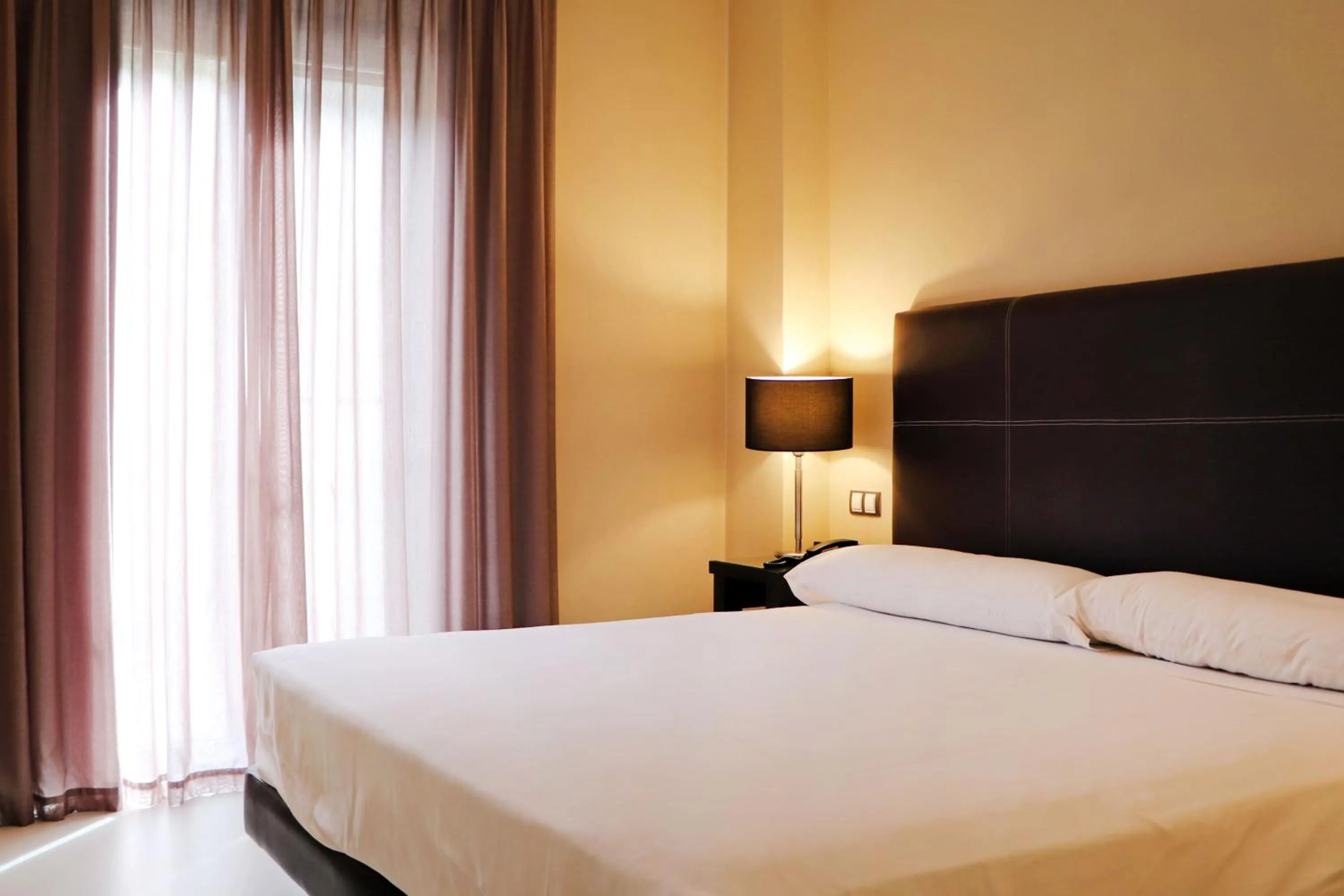 Bed in Hotel Real Balneario Carlos III