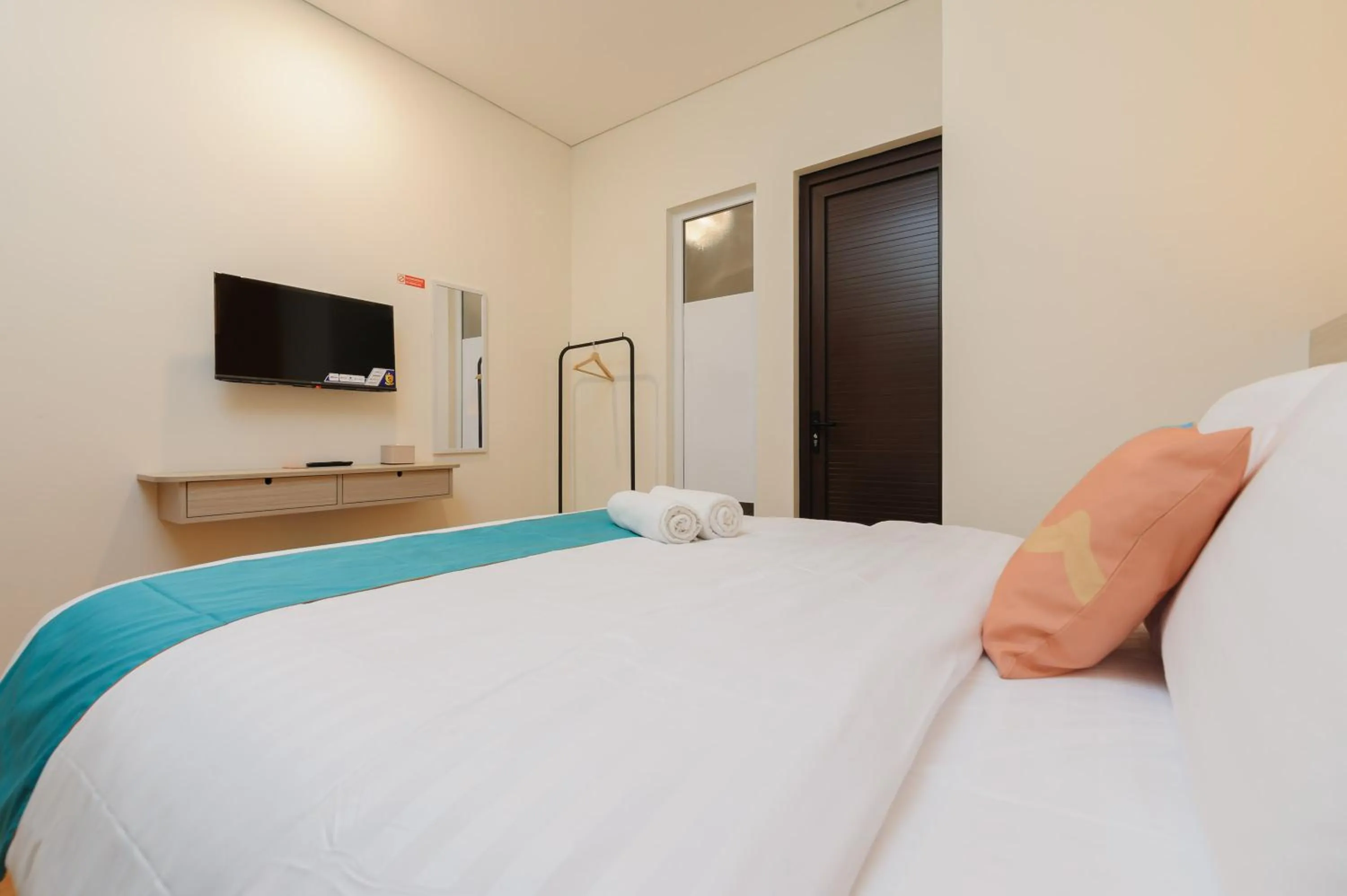 Bedroom, Bed in Sans Hotel Tajur Bogor