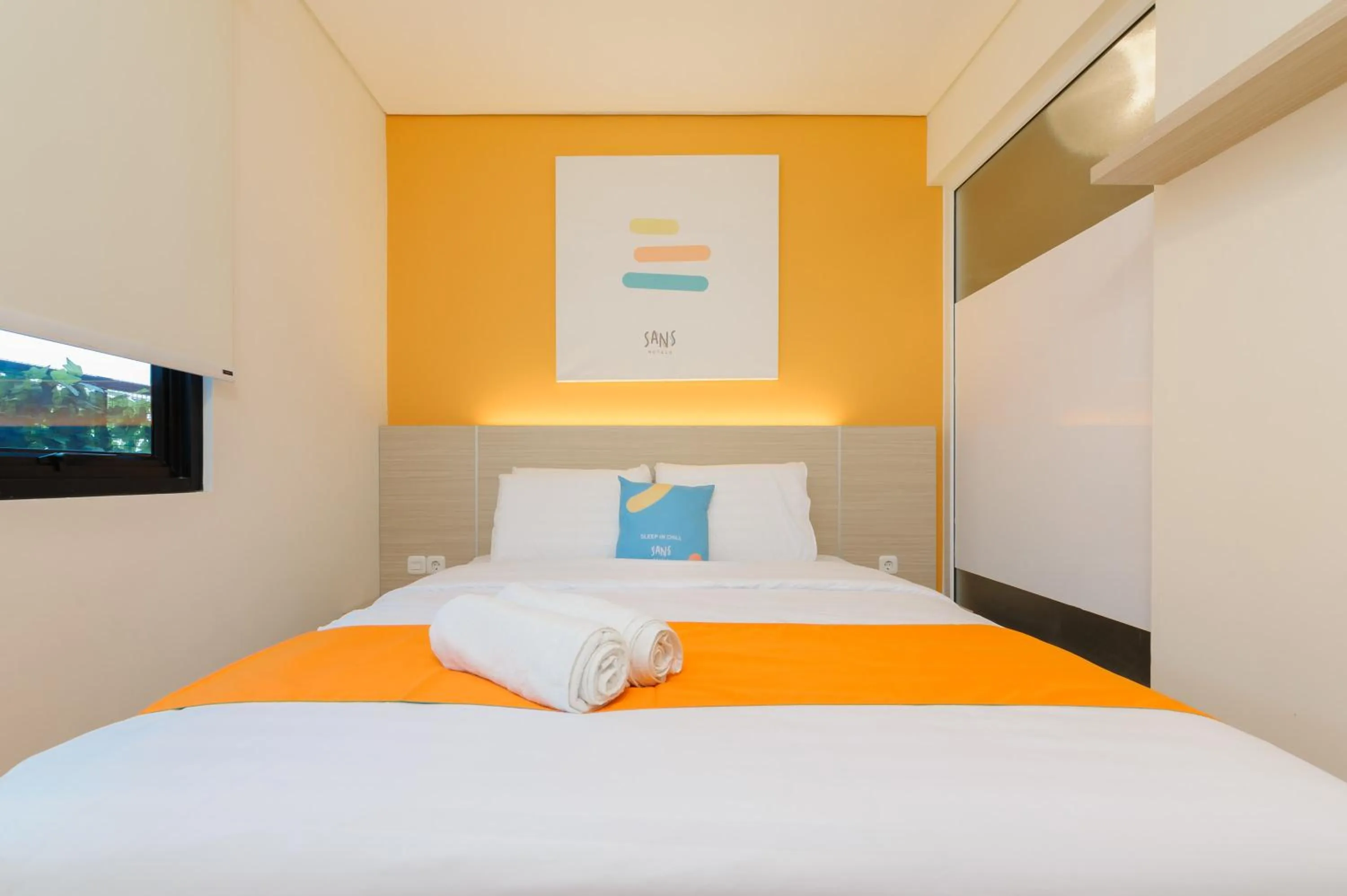 Bedroom, Bed in Sans Hotel Tajur Bogor