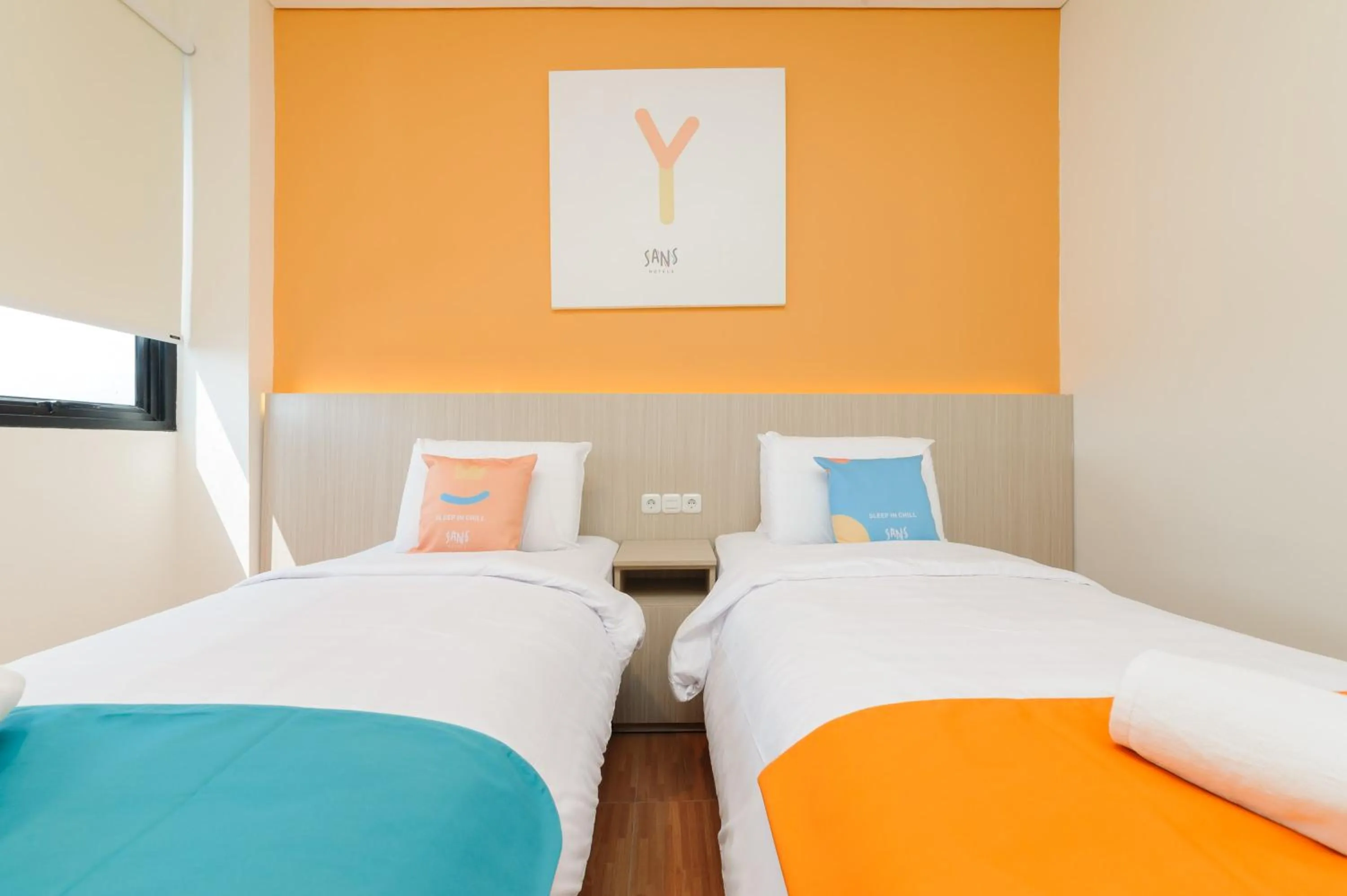 Bedroom, Bed in Sans Hotel Tajur Bogor