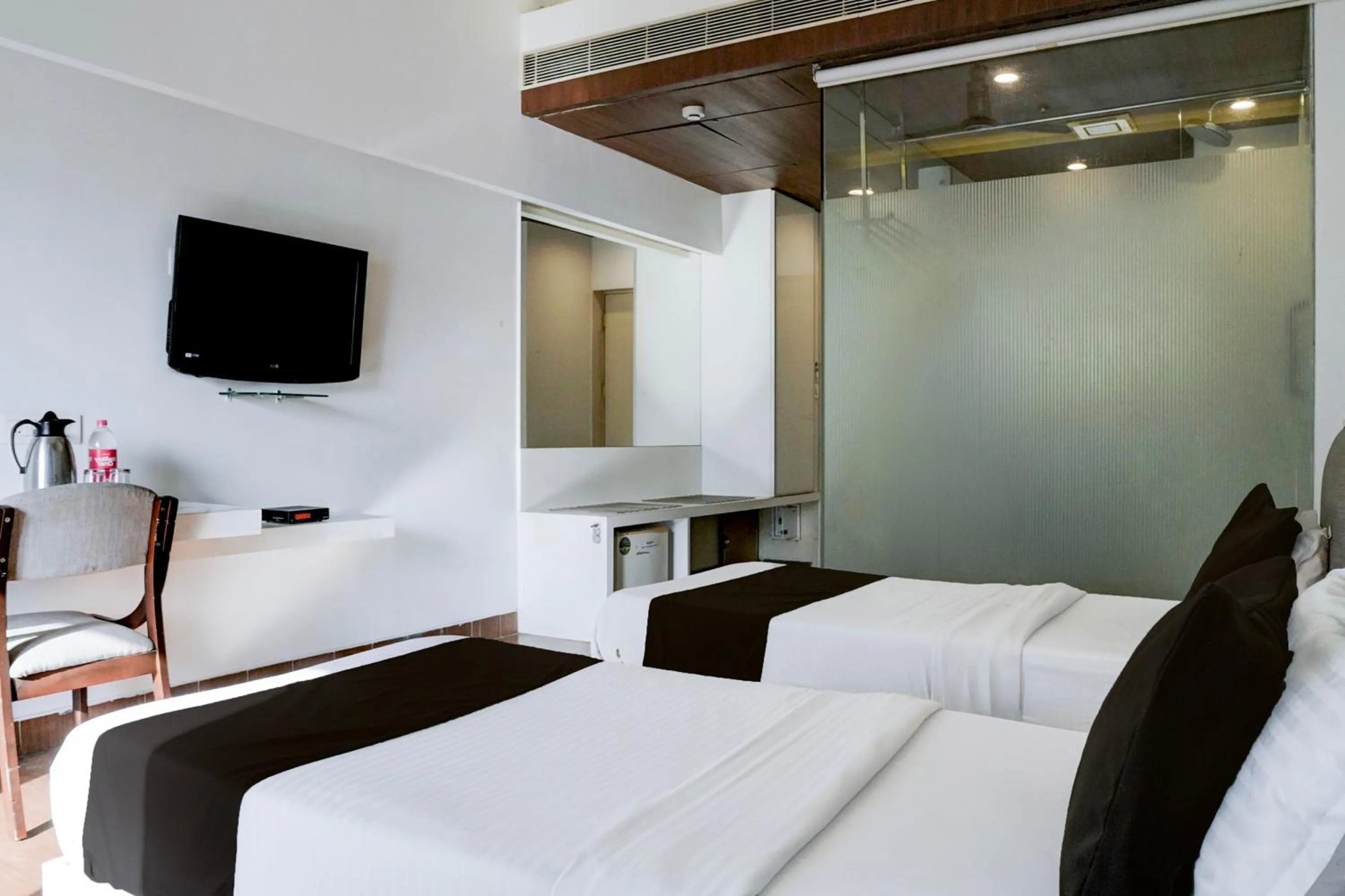 Deluxe Twin Room - single occupancy in Super Collection O Limda Chowk Formerly Hotel Harmony