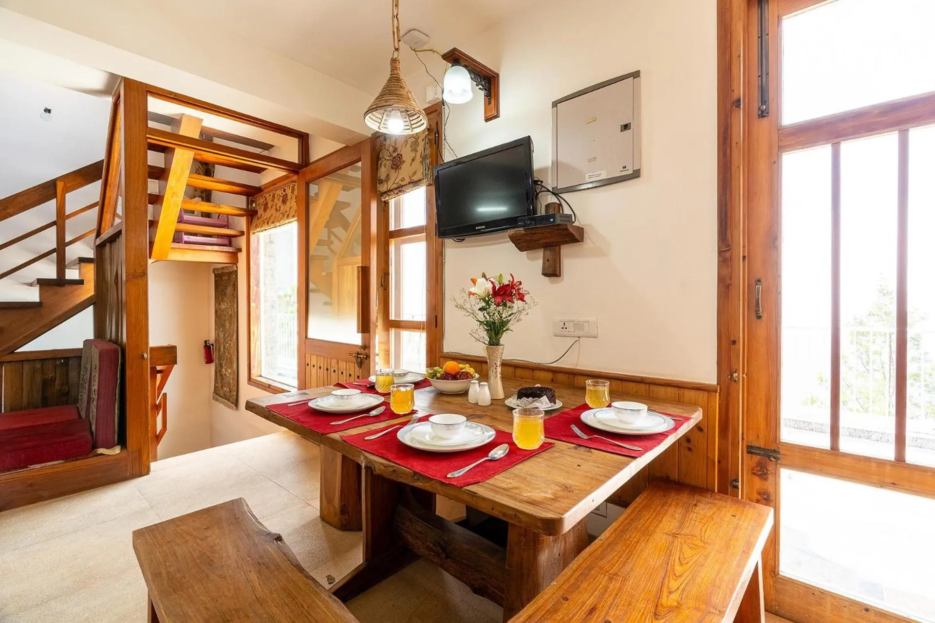 Dining area in StayVista at The Rustic Retreat - 4BHK Valley View villa with Lawn, Bonfire