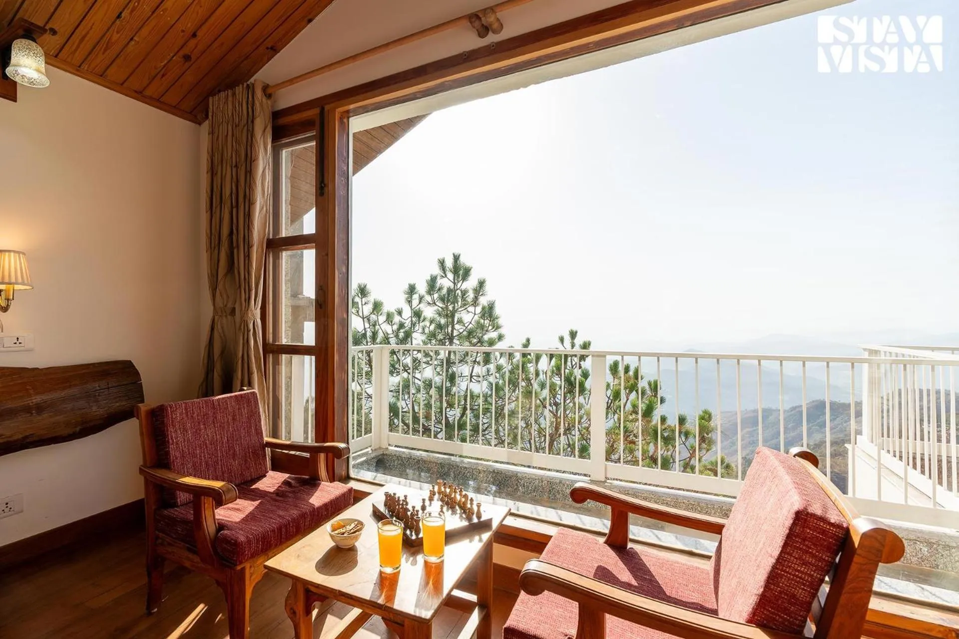 Seating area in StayVista at The Rustic Retreat - 4BHK Valley View villa with Lawn, Bonfire