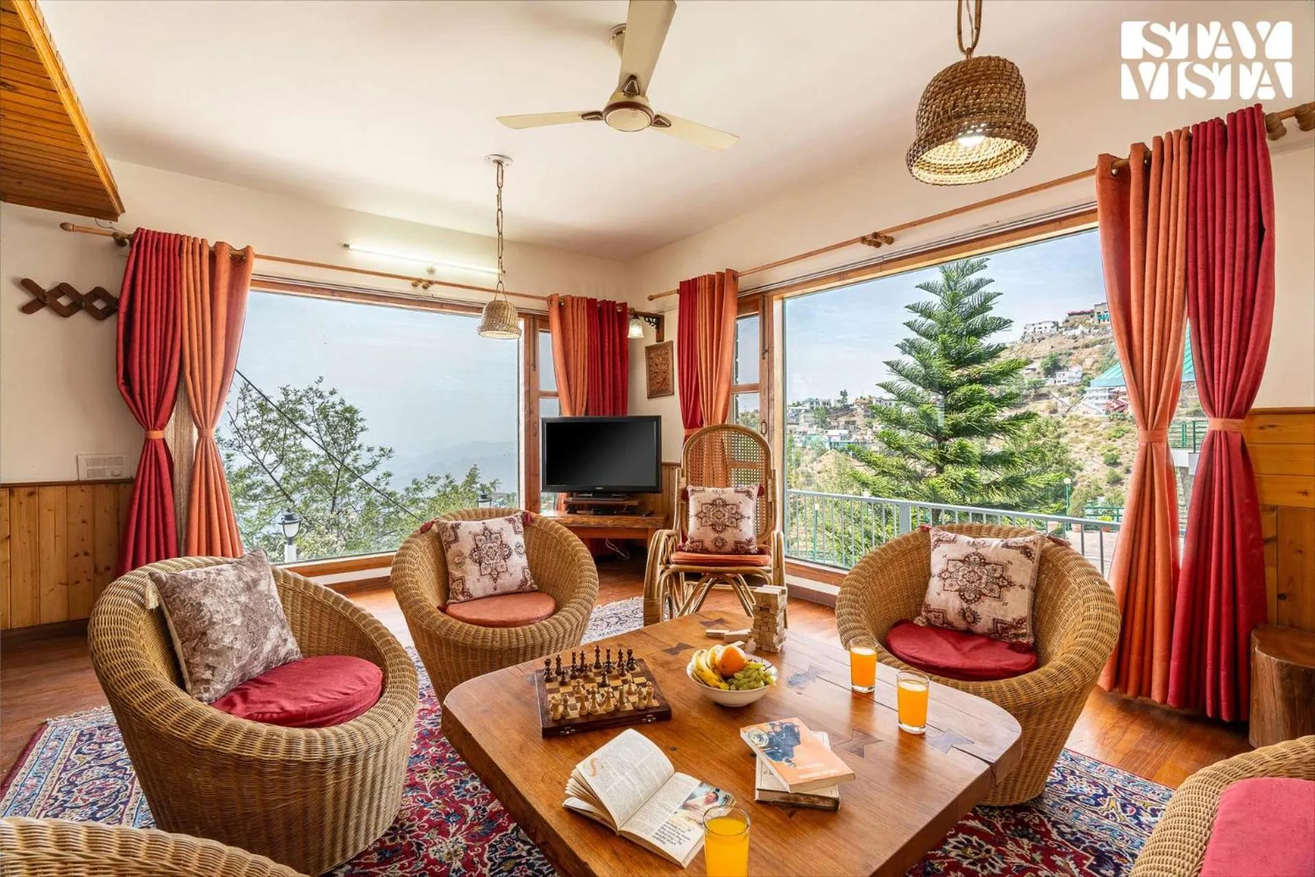 Living room in StayVista at The Rustic Retreat - 4BHK Valley View villa with Lawn, Bonfire