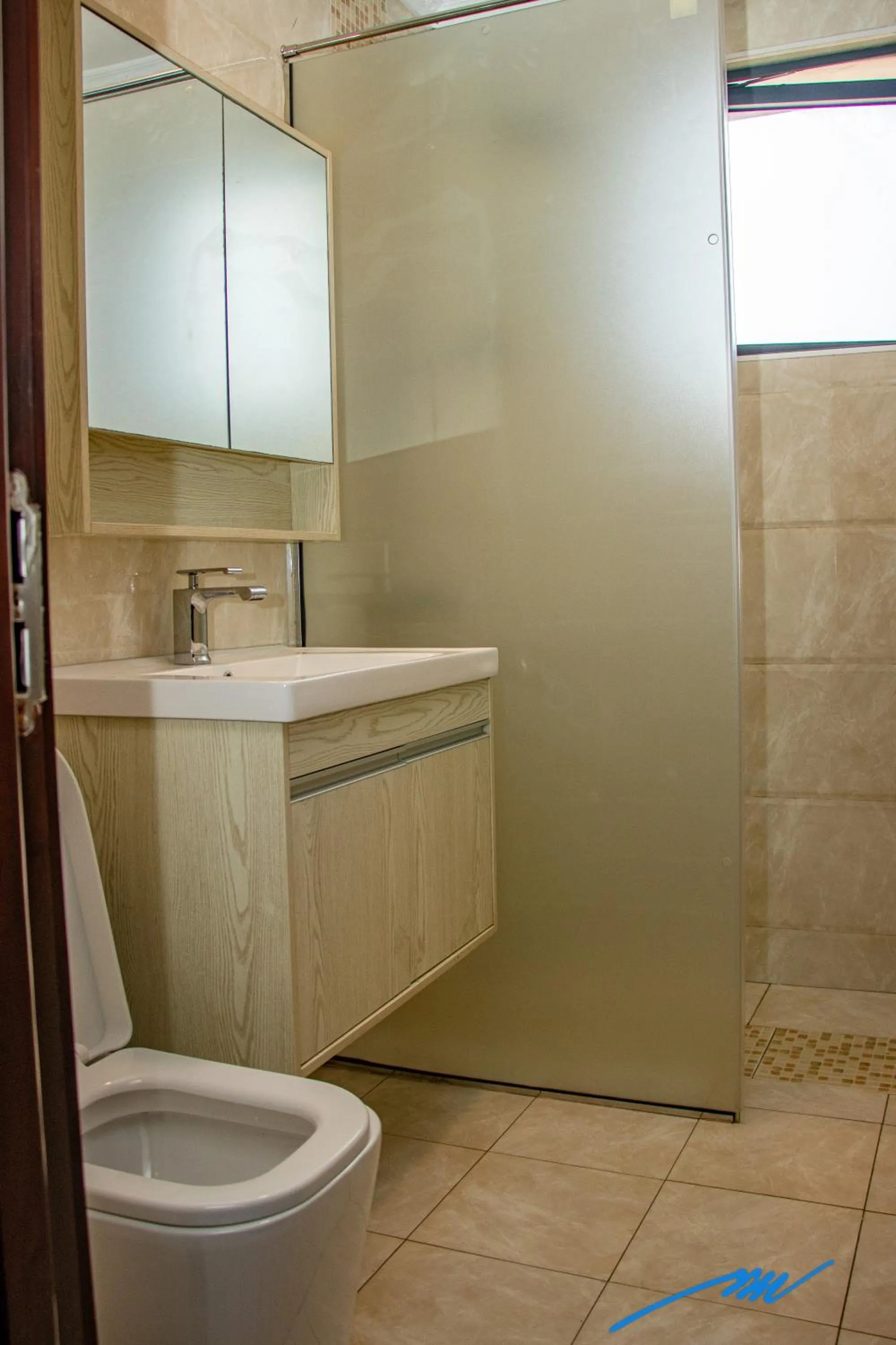 Shower in Mansah Plus Hotel and Apartments
