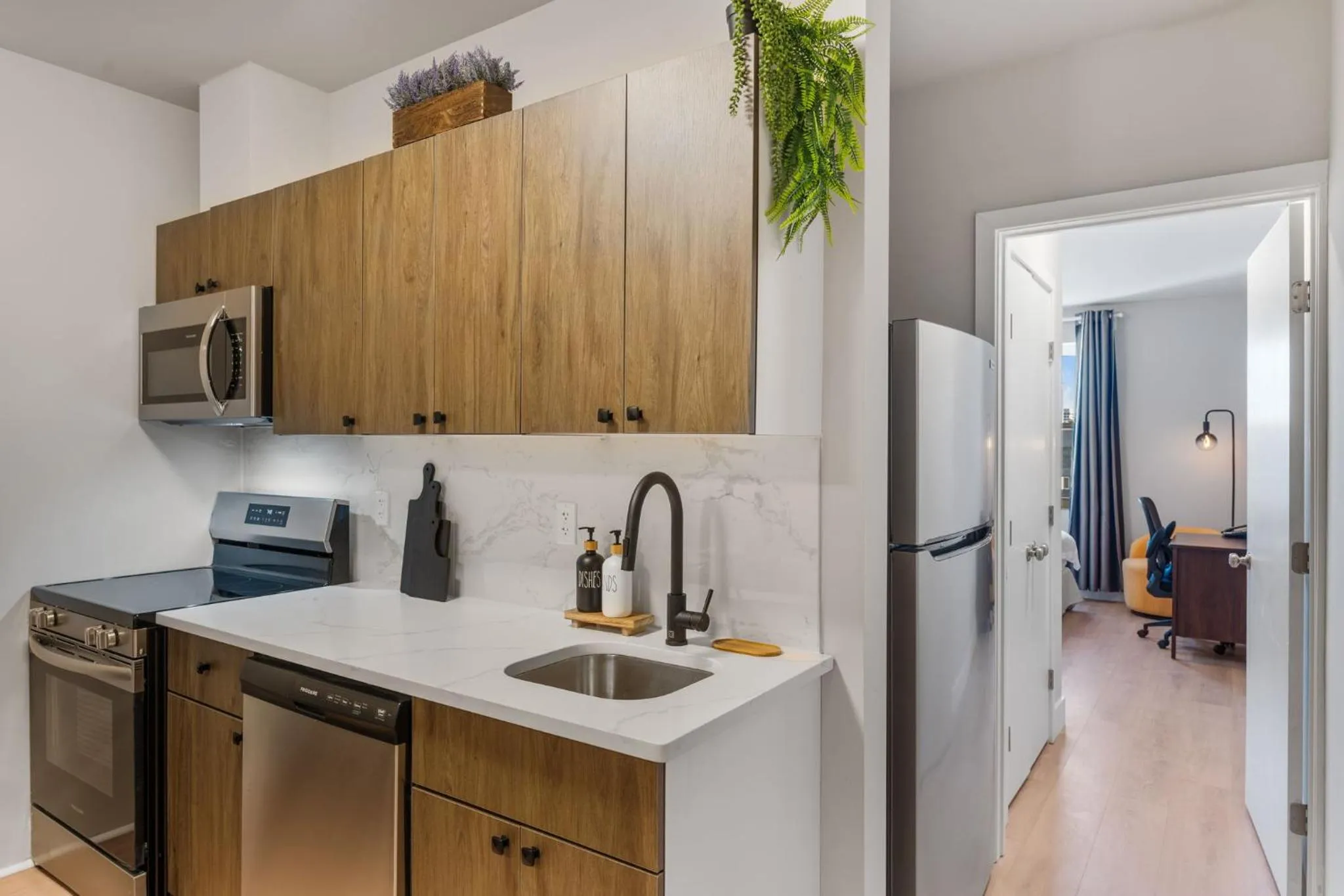 kitchen in 4211 Suites