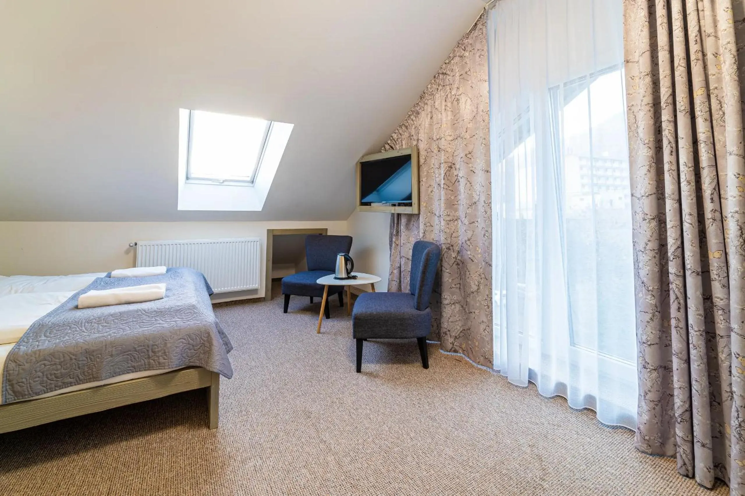 Bed in Aparthotel Belveder