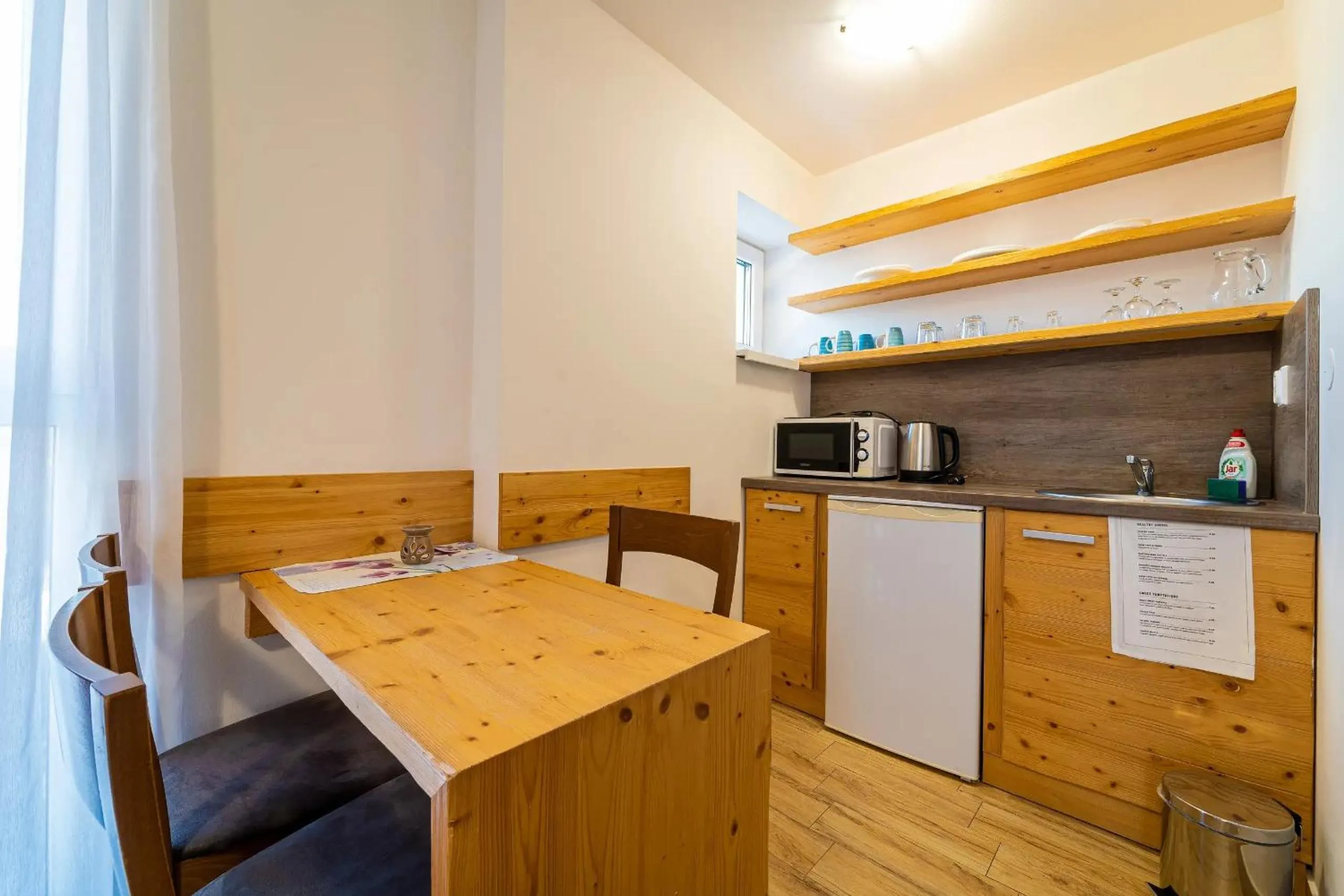 Kitchen or kitchenette in Aparthotel Belveder