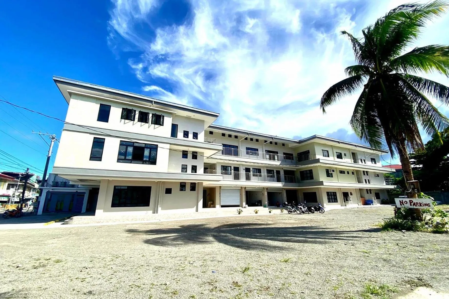 Property building in La Patria Baybay Tourist Inn powered by Cocotel