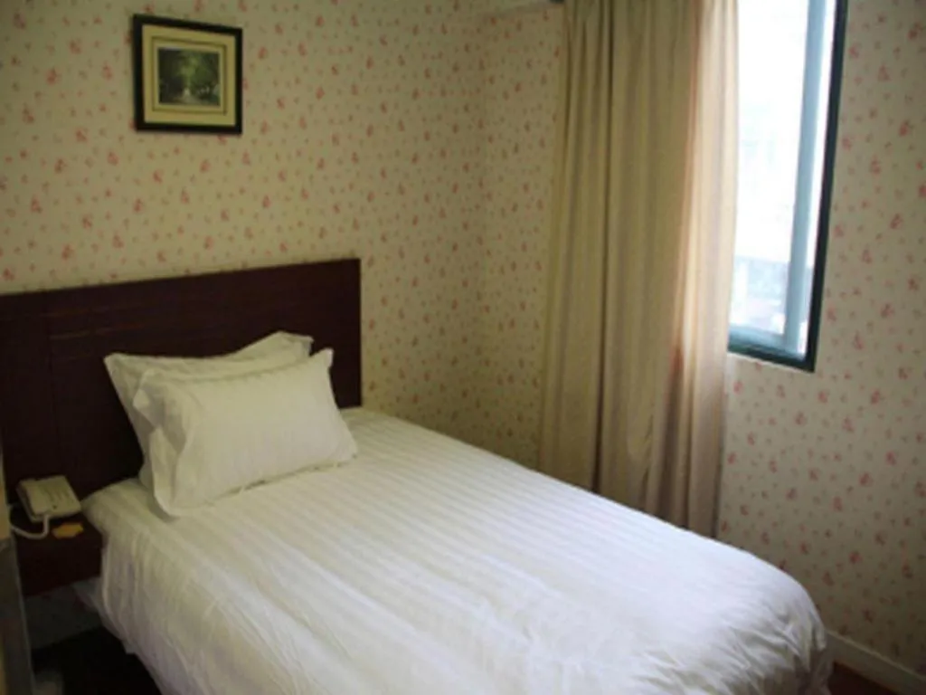 Bed in Jinjiang Inn Shanghai Qingpu