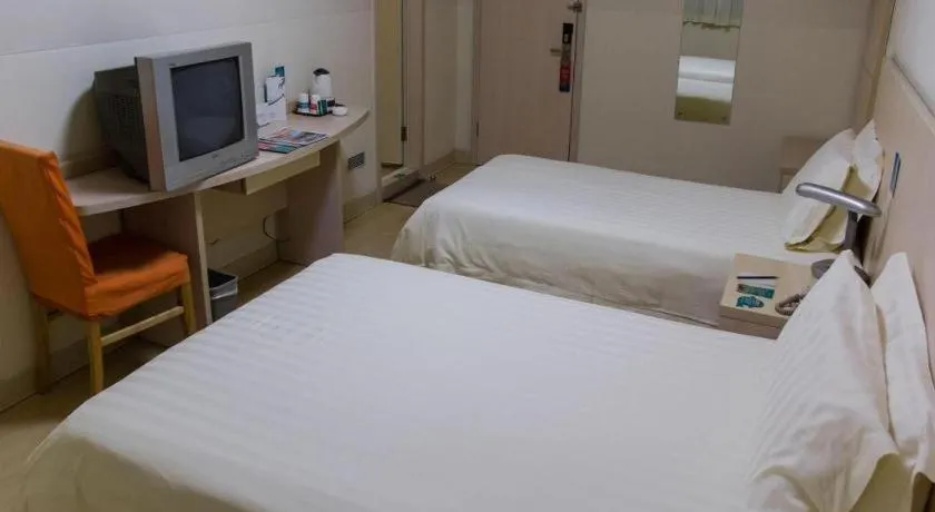 Bed in Jinjiang Inn Shanghai Qingpu