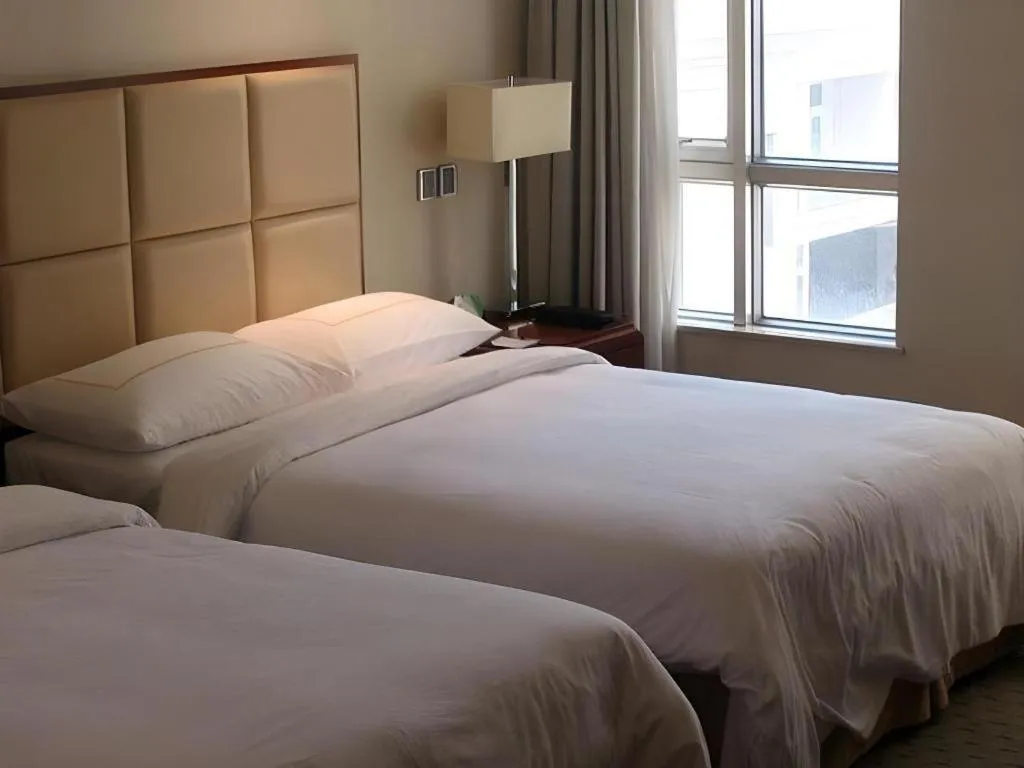 Bed in Xiamen Fortune Hotel