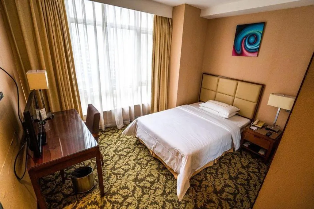 Bed in Xiamen Fortune Hotel