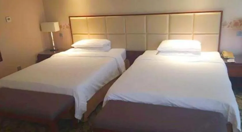 Bed in Xiamen Fortune Hotel