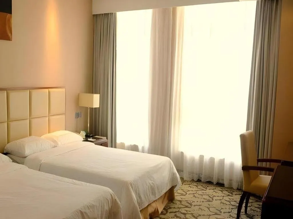 Bed in Xiamen Fortune Hotel